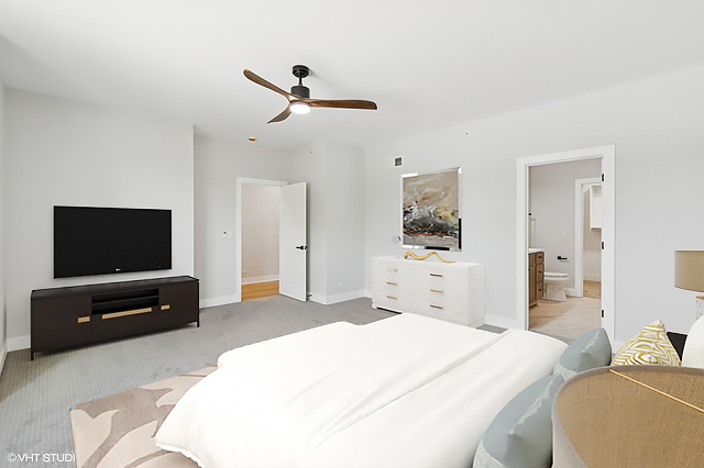 1816 Rosemary Road Highland Park, IL 60035 - Photo 20 of 35 a bedroom with a bed and a flat screen tv