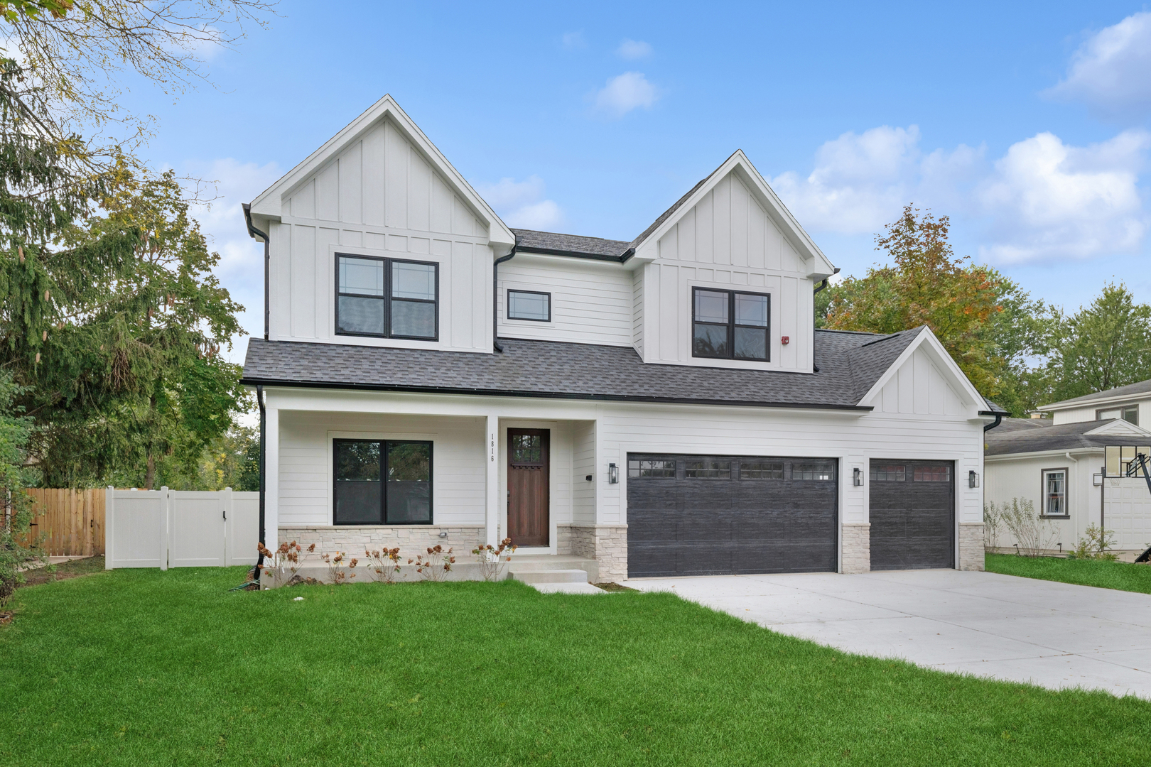 1816 Rosemary Road Highland Park, IL 60035 - Photo 2 of 35 a front view of a house with a yard and garage