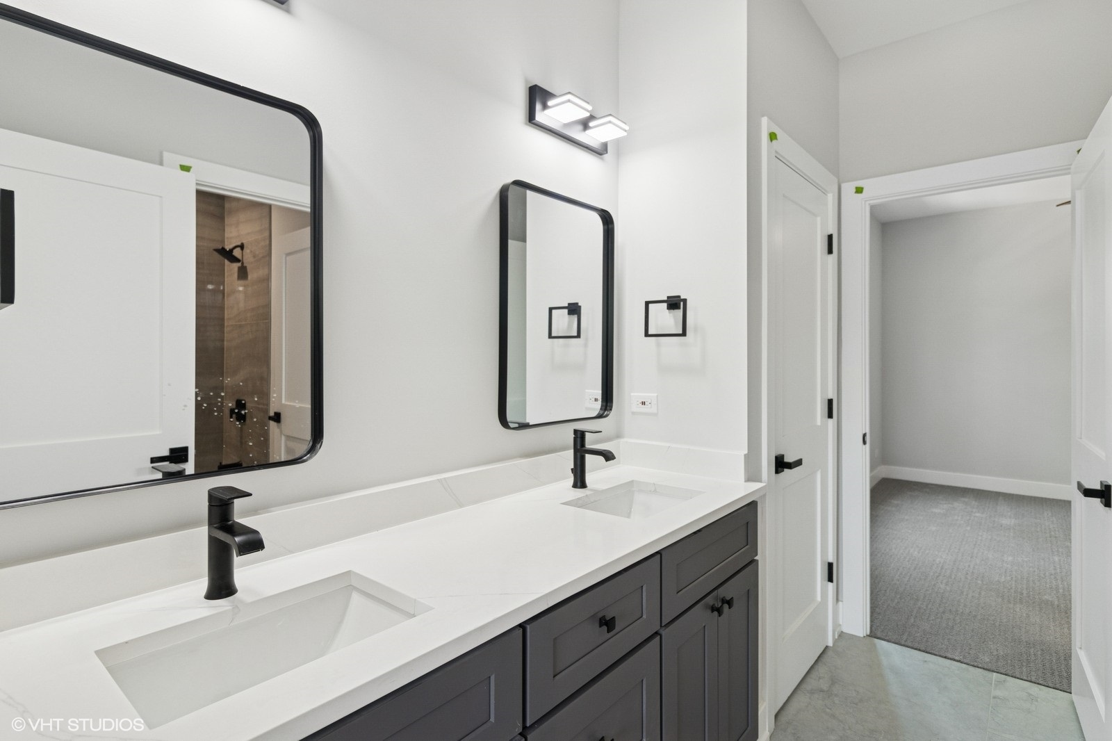 1816 Rosemary Road Highland Park, IL 60035 - Photo 24 of 35 a bathroom with double vanity sinks and a mirror