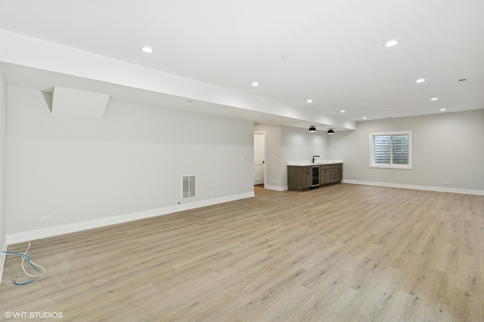 1816 Rosemary Road Highland Park, IL 60035 - Photo 27 of 35 a view of empty room with wooden floor and windows