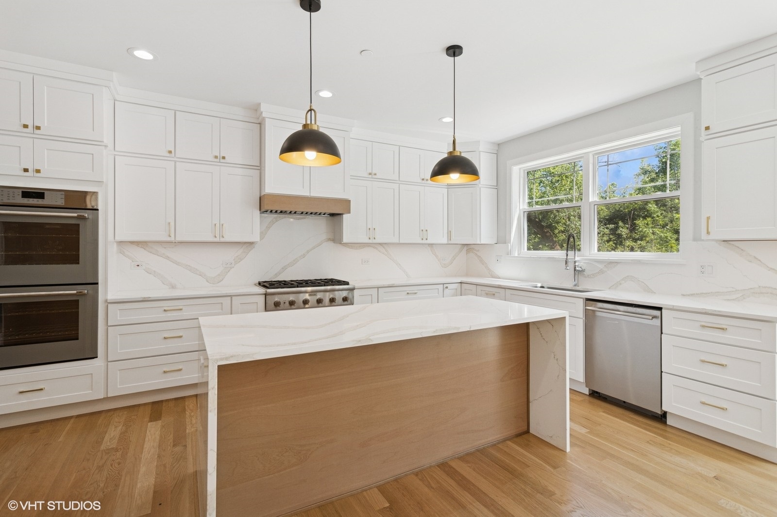 1816 Rosemary Road Highland Park, IL 60035 - Photo 6 of 35 a kitchen with stainless steel appliances granite countertop a stove a sink and a wooden floors