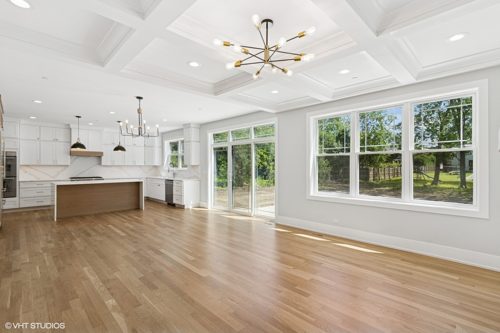 1816 Rosemary Road Highland Park, IL 60035 - Photo 9 of 35 a view of an empty room with wooden floor and a window