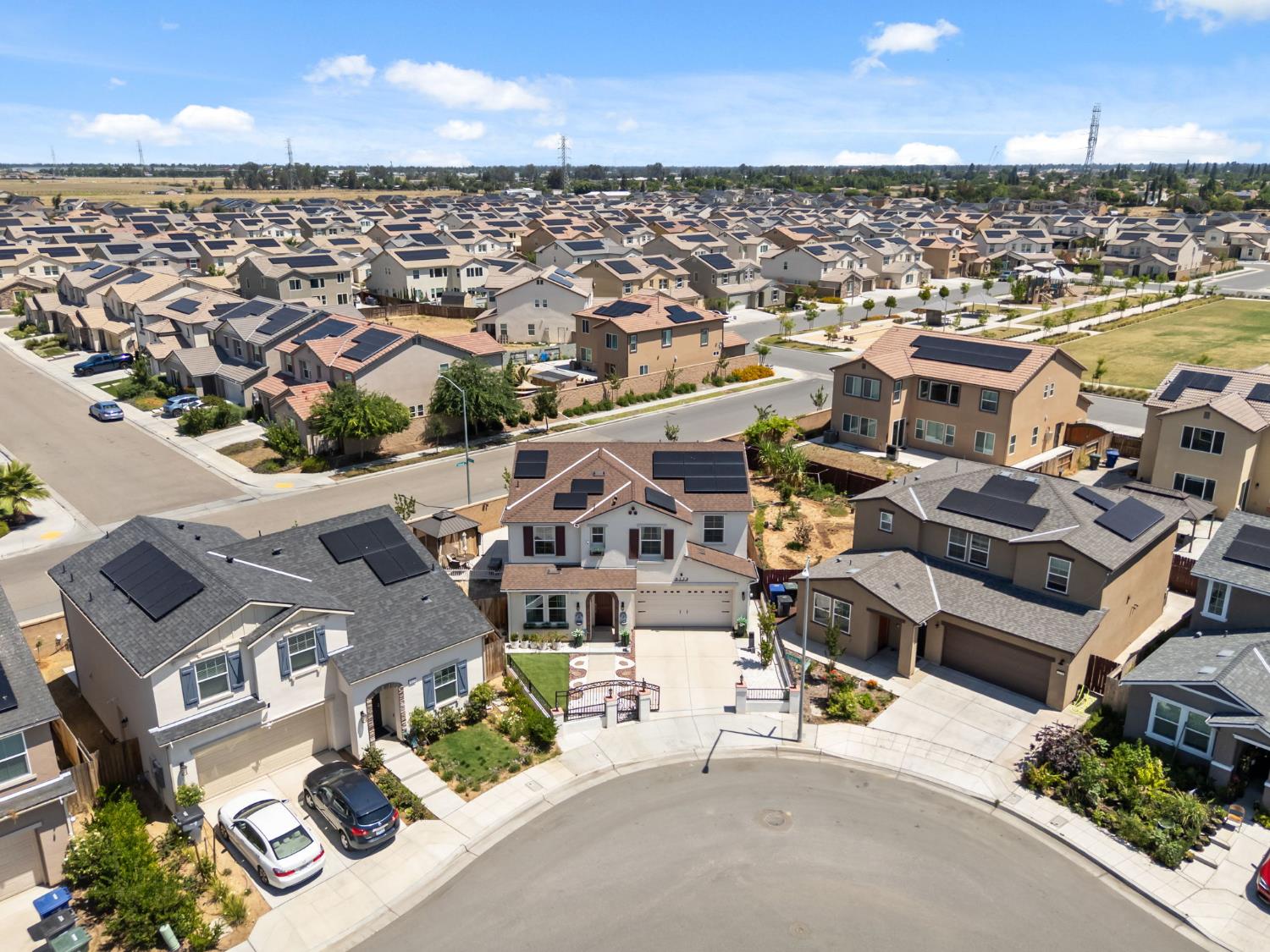 6326 West Richert Avenue Fresno, CA 93723 - Photo 35 of 45 an aerial view of a house with parking space