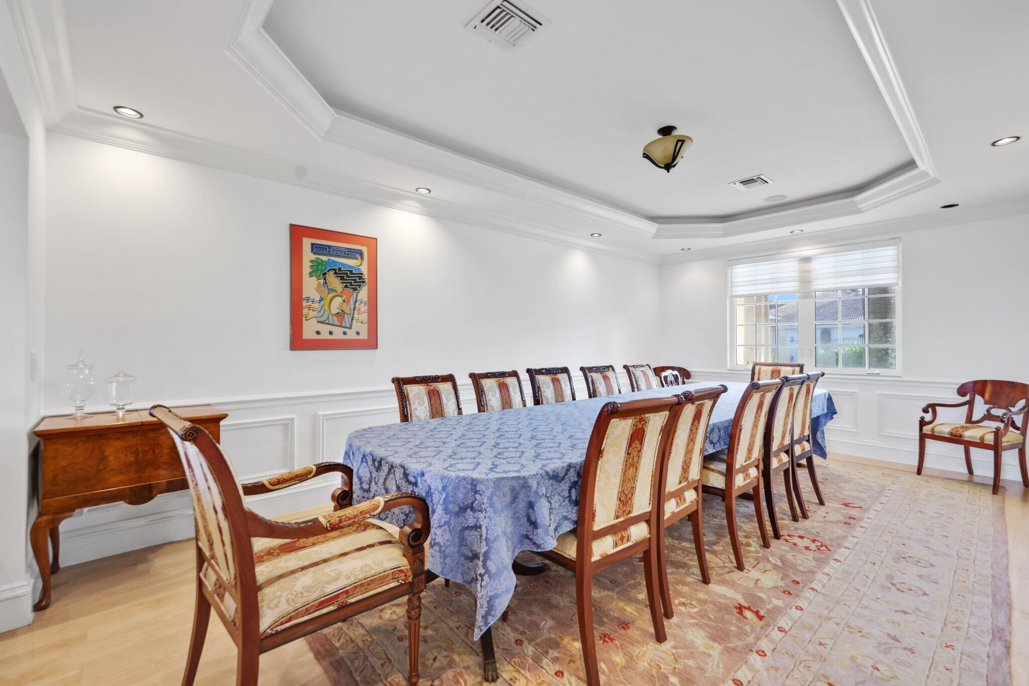 7355 Mandarin Drive Boca Raton, FL 33433 - Photo 7 of 18 a view of a dining room with furniture