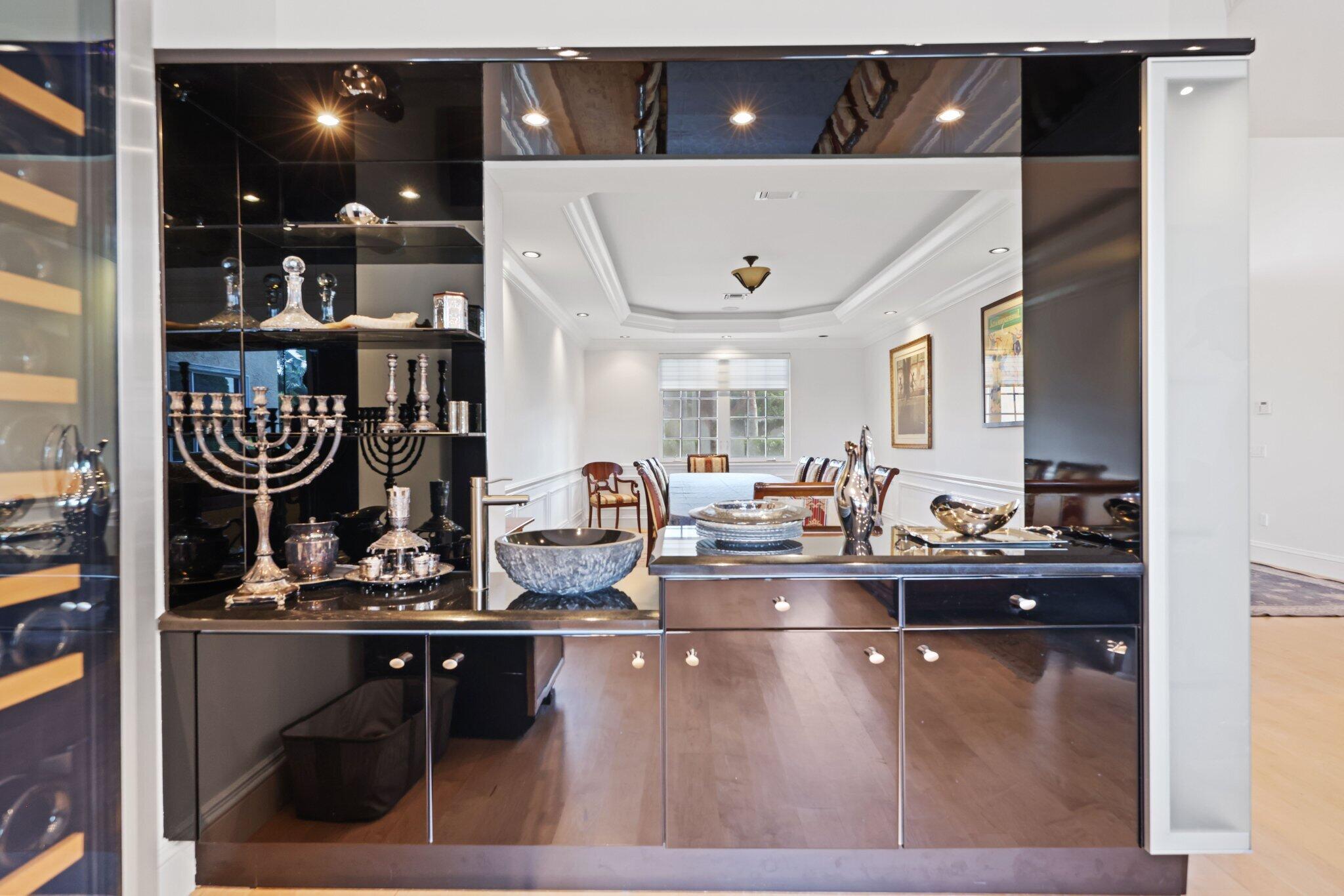 7355 Mandarin Drive Boca Raton, FL 33433 - Photo 8 of 18 a kitchen with lots of counter top space and a ceiling fan