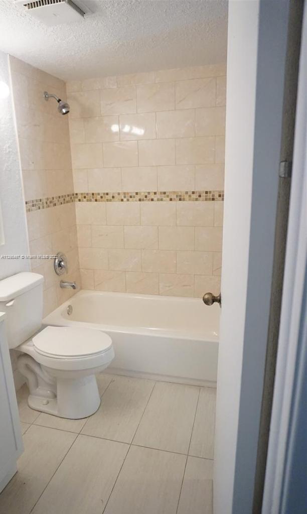 The Crossings Miami, FL 33186 - Photo 11 of 16 a bathroom with a toilet and a bathtub