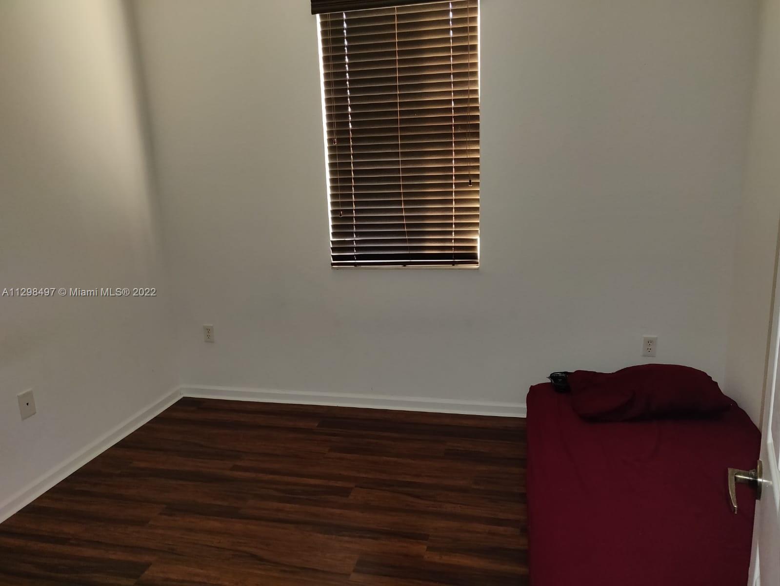 The Crossings Miami, FL 33186 - Photo 16 of 16 a view of entryway with wooden floor