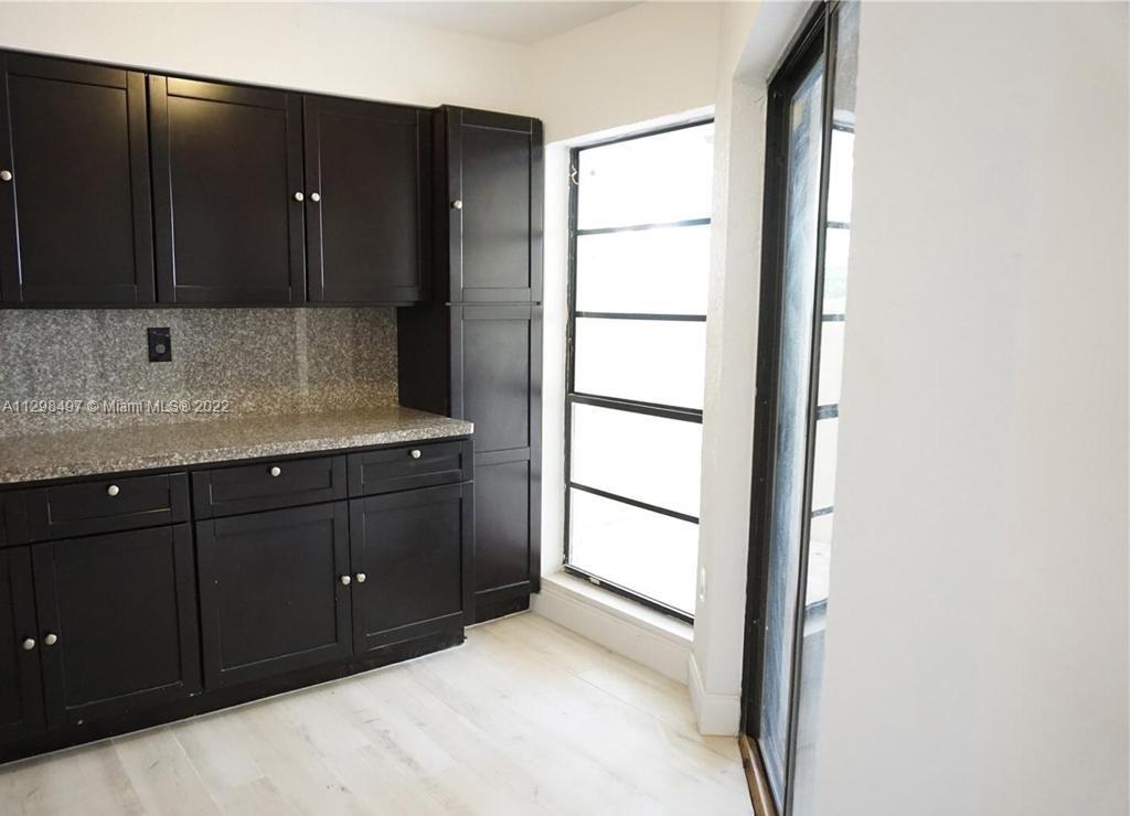 The Crossings Miami, FL 33186 - Photo 7 of 16 a bathroom with a shower a sink and a mirror