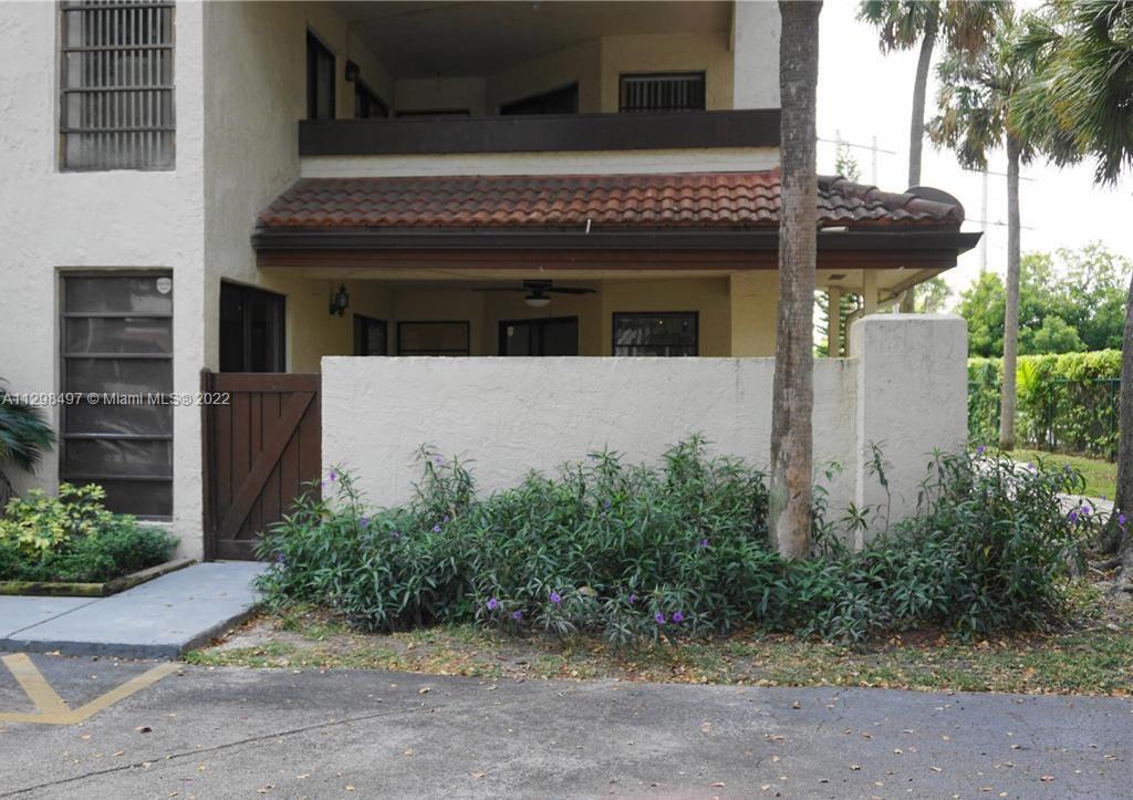 The Crossings Miami, FL 33186 - Photo 10 of 16 a front view of a house with garden