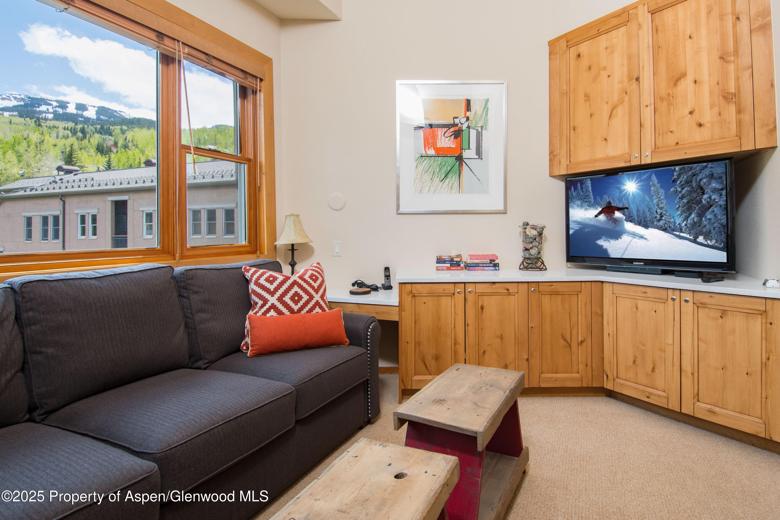 425 Wood Road, Unit 48 Snowmass Village, CO 81615 - Photo 24 of 41 a living room with furniture and a window