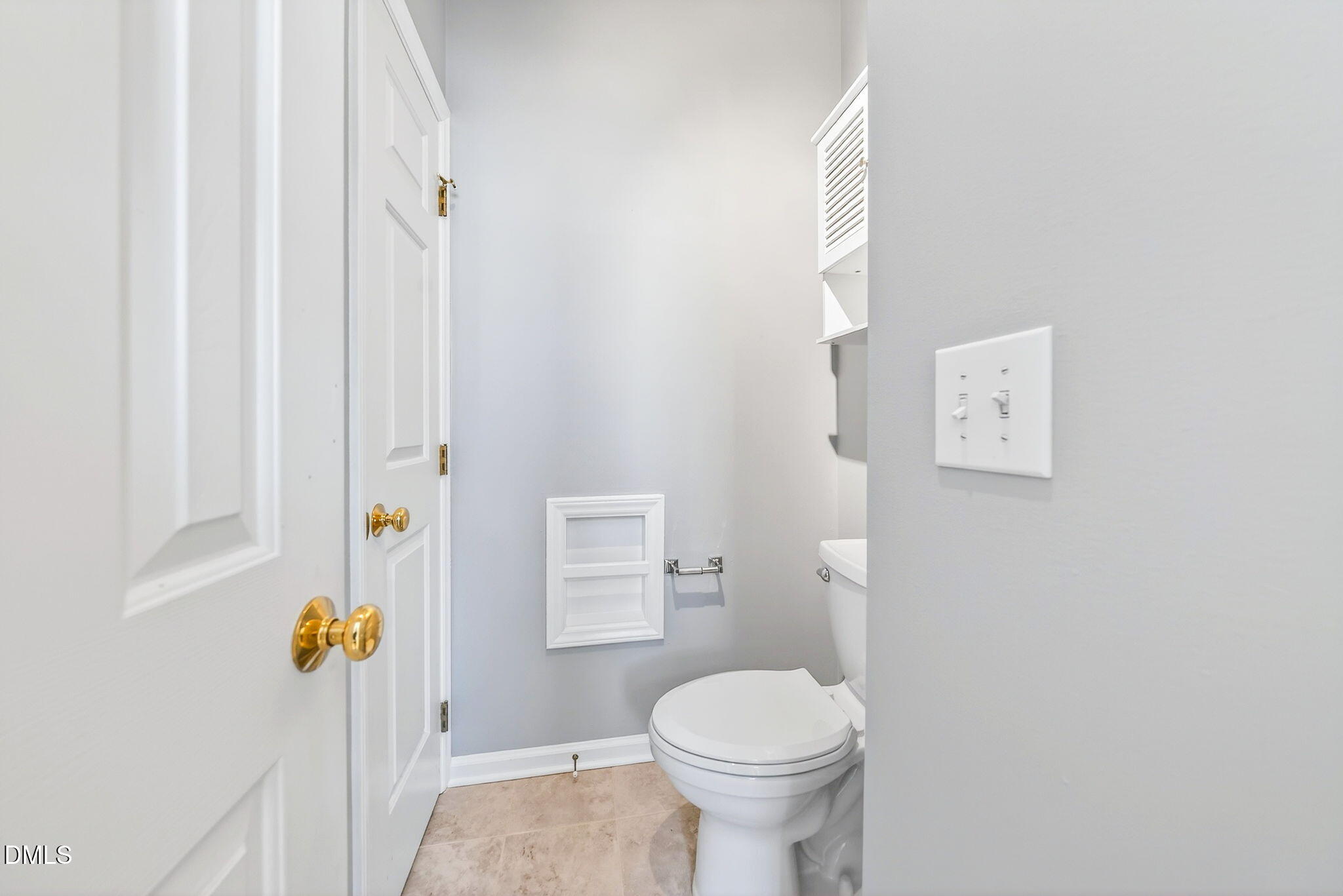 303 Roebling Lane Cary, NC 27513 - Photo 18 of 30 a bathroom with a sink and toilet