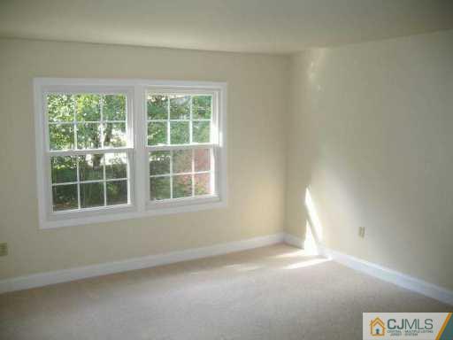 1 Hughes Road Somerset, NJ 08873 - Photo 6 of 8 an empty room with a window