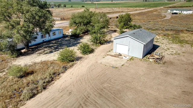 an outdoor space with wooden fence