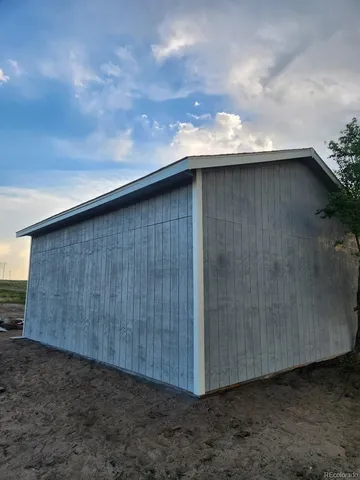 a view of a yard with an outdoor space