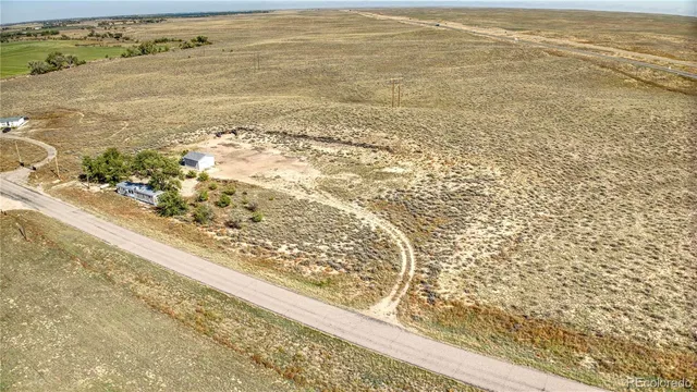 a view of a swimming pool and an outdoor space