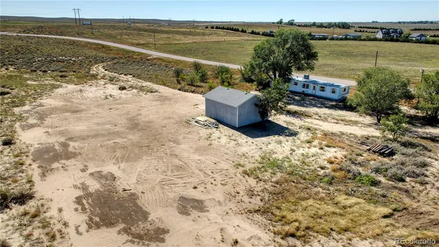 a view of a lake with a beach
