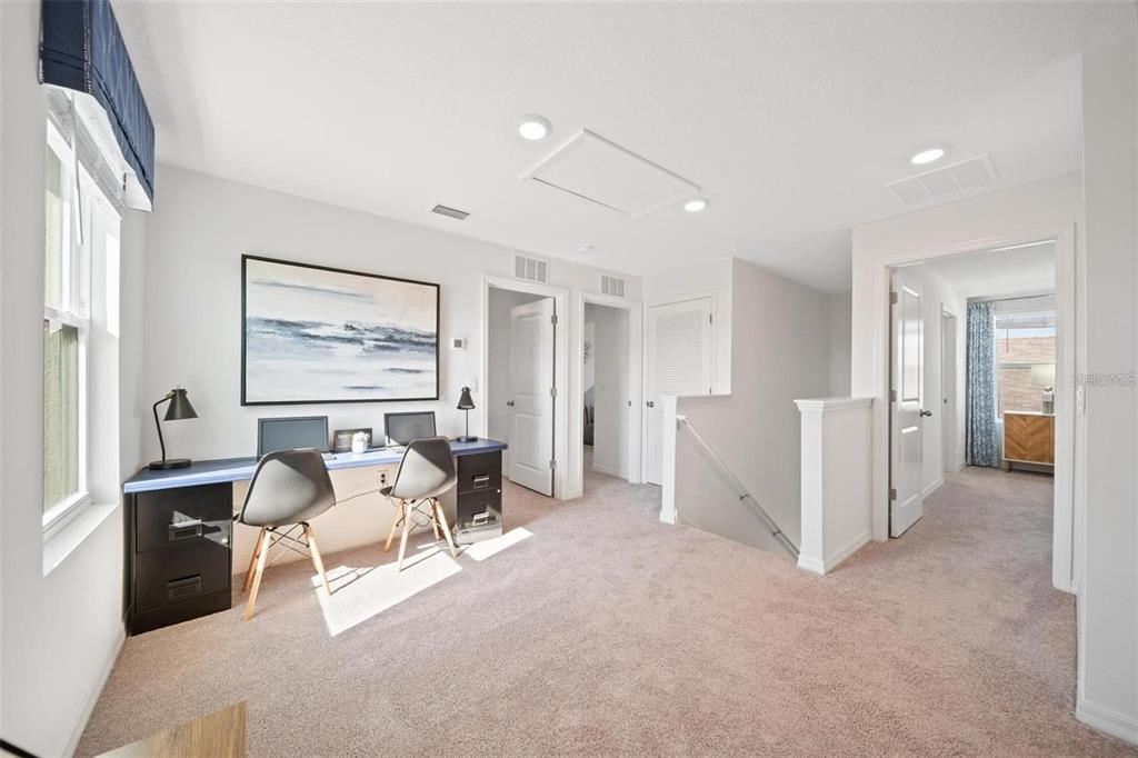 16716 Glacier Bay Loop Wimauma, FL 33598 - Photo 9 of 13 a living room with furniture and a windows