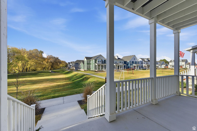 1038 South Old Towne Road Layton, UT 84041 - Photo 3 of 39 Covered porch with white railings and columns