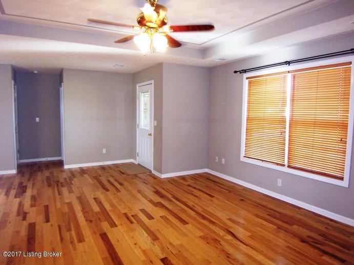 415 Ed Pile Road Bardstown, KY 40004 - Photo 2 of 33 Spacious Living Room with decorative ceilings & beautiful hardwood floors.