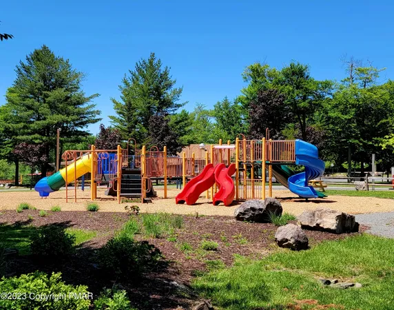 a view of swimming pool from a balcony
