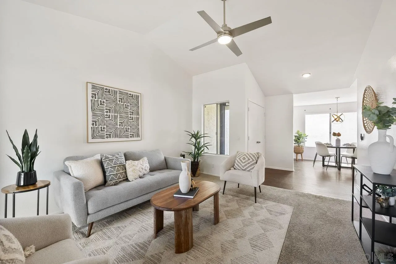 143 Cerco Rosado San Marcos, CA 92069 - Photo 1 of 28 a living room with furniture and a potted plant