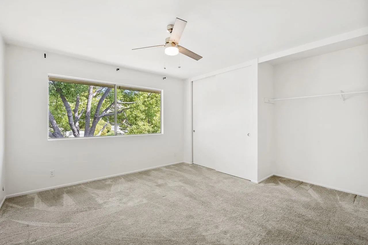 143 Cerco Rosado San Marcos, CA 92069 - Photo 18 of 28 an empty room with large windows