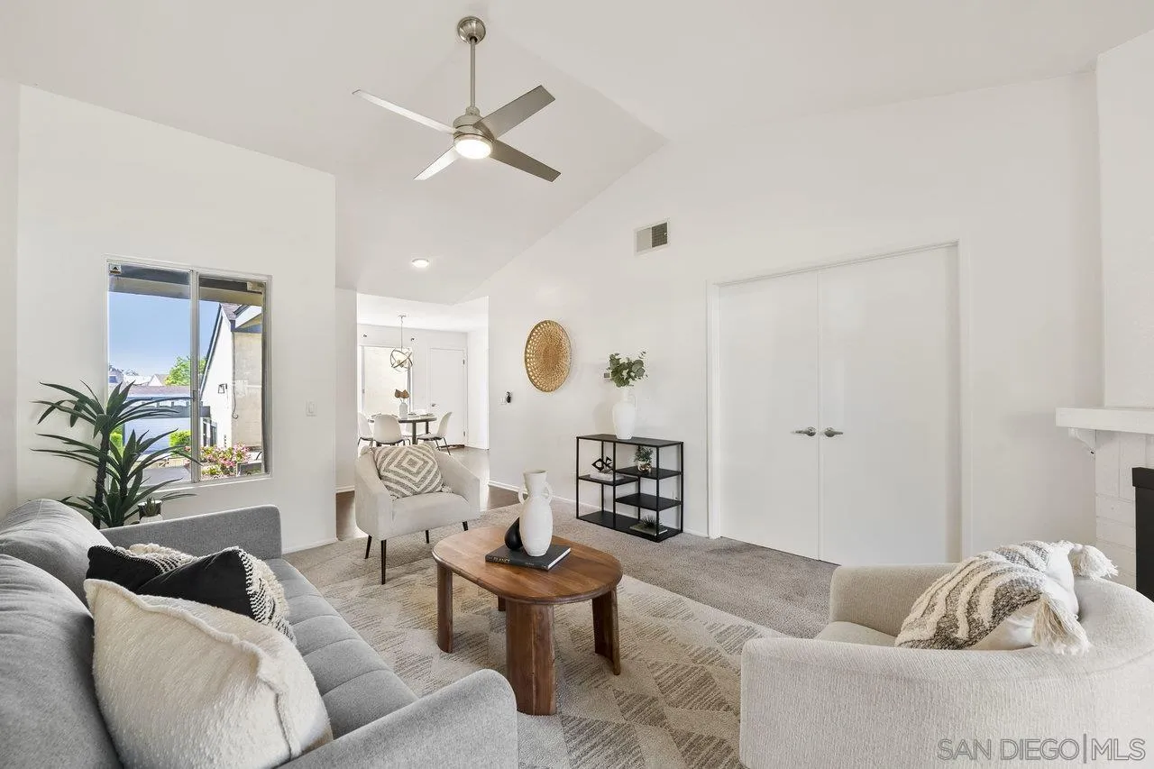 143 Cerco Rosado San Marcos, CA 92069 - Photo 2 of 28 a living room with furniture