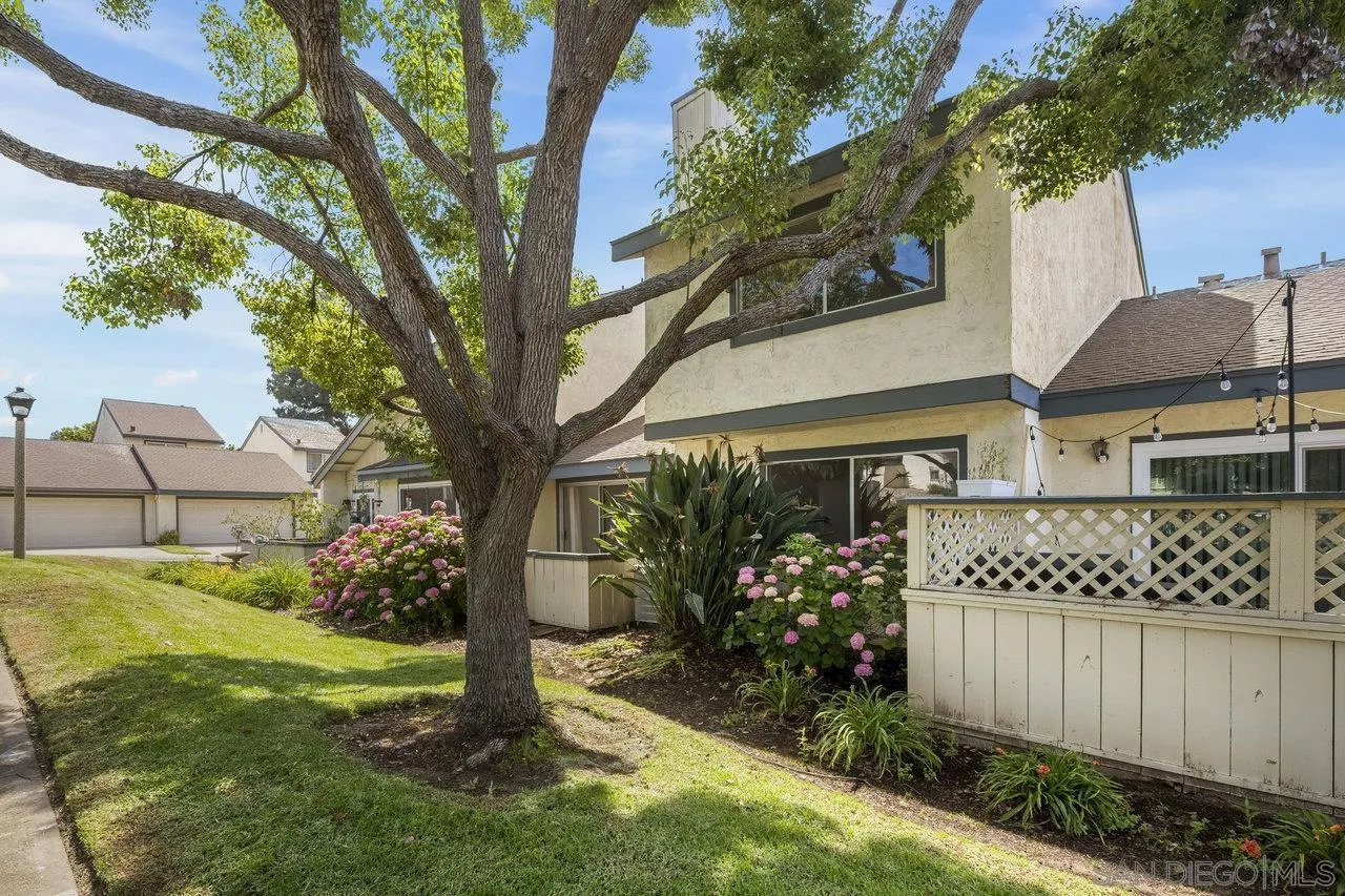 143 Cerco Rosado San Marcos, CA 92069 - Photo 27 of 28 a front view of a house with a yard