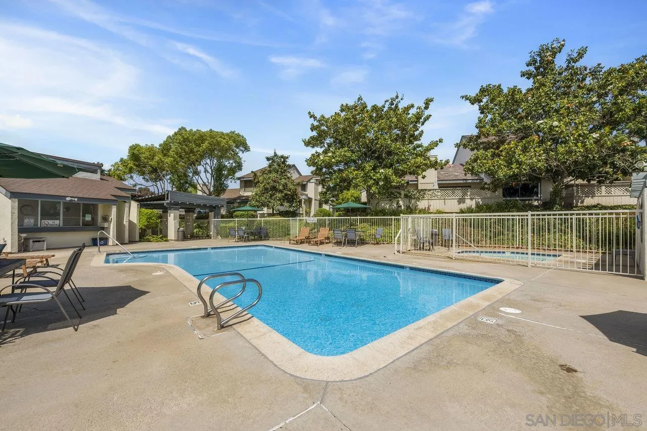 143 Cerco Rosado San Marcos, CA 92069 - Photo 28 of 28 a view of a swimming pool with a lounge chair