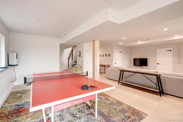 a room with furniture and a wooden floor