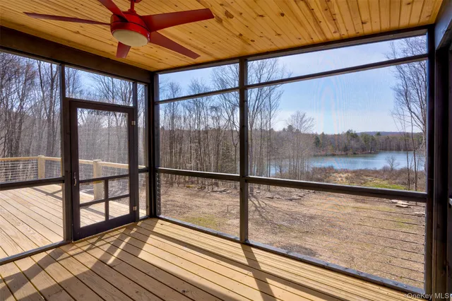 a view of a lake from a balcony