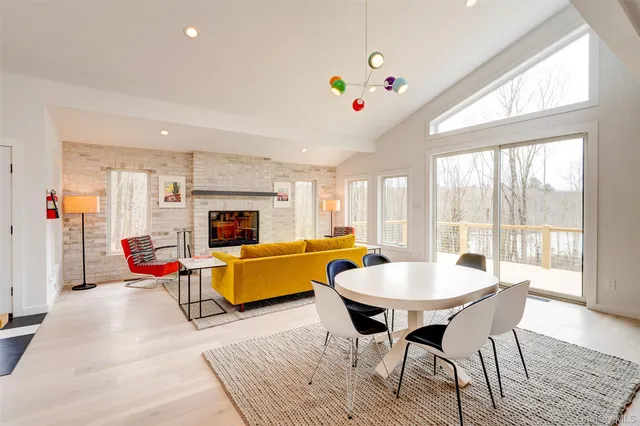 a kitchen that has a lot of cabinets and appliances
