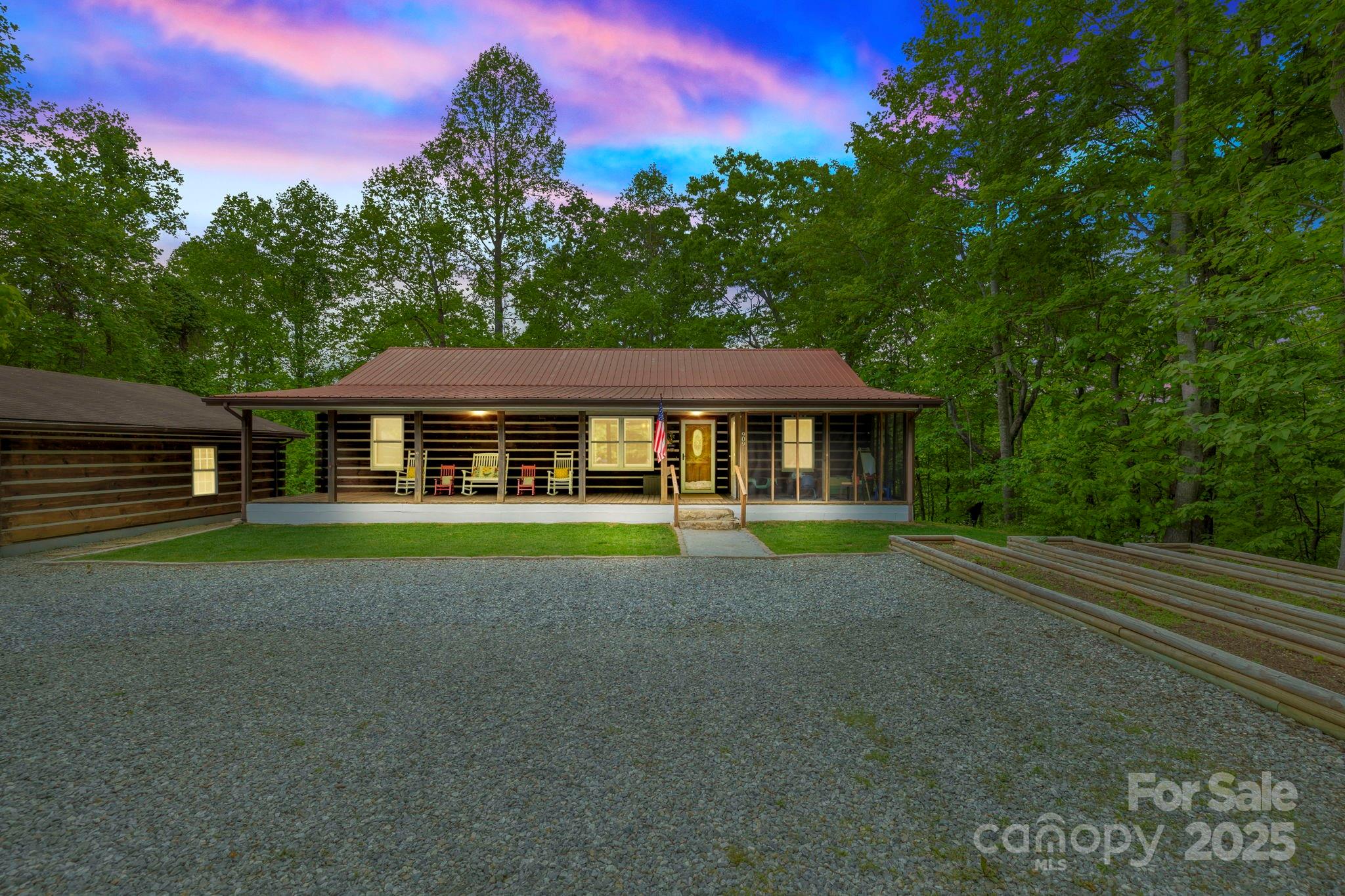 909 Pearson Falls Road Saluda, NC 28773 - Photo 1 of 41 Gallery Image 1