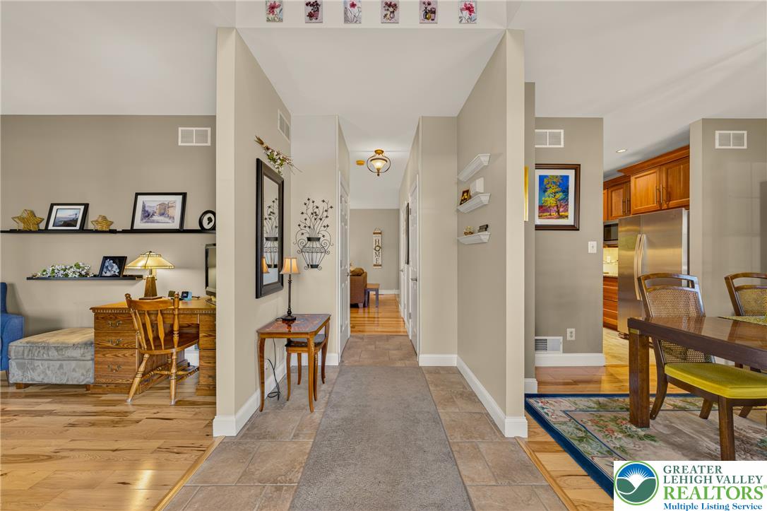 1702 Red Bud Road Quakertown, PA 18951 - Photo 5 of 68 A central hall provides a seamless transition between diverse living spaces.