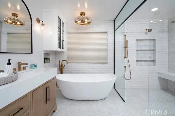 a bathroom with a double vanity sink and a mirror