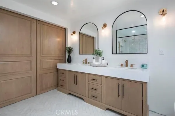 a kitchen with a sink and a stove