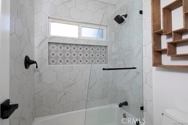 14085 Proctor Valley Road Jamul, CA 91935 - Photo 28 of 70 a bathroom with a bathtub