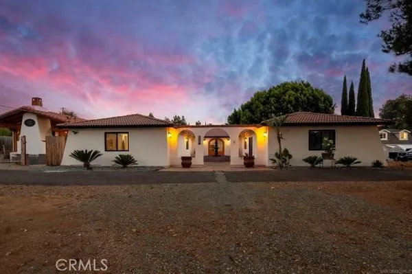 a vase of flowers sitting on a dining table