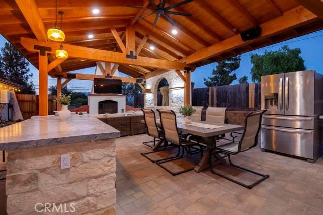 14085 Proctor Valley Road Jamul, CA 91935 - Photo 36 of 70 a view of a dinning table and chairs in the patio