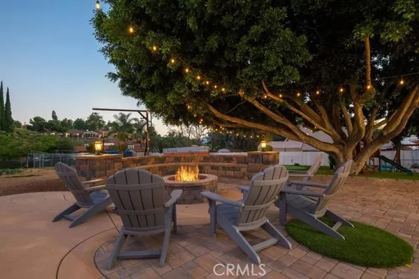 a view of a garden with a deck