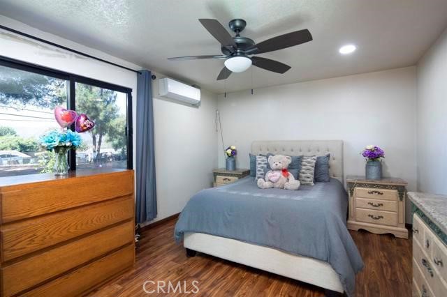 14085 Proctor Valley Road Jamul, CA 91935 - Photo 64 of 70 a bedroom with a bed and a dresser