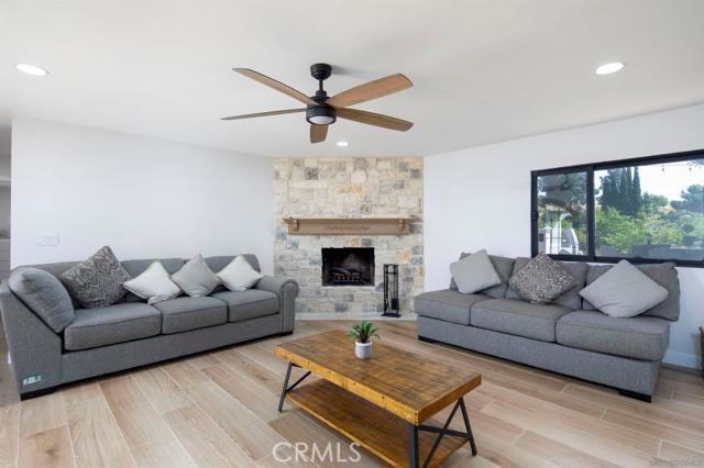 14085 Proctor Valley Road Jamul, CA 91935 - Photo 8 of 70 a living room with furniture and a fireplace