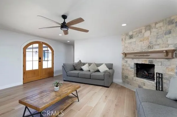 a kitchen with stainless steel appliances white cabinets and a sink