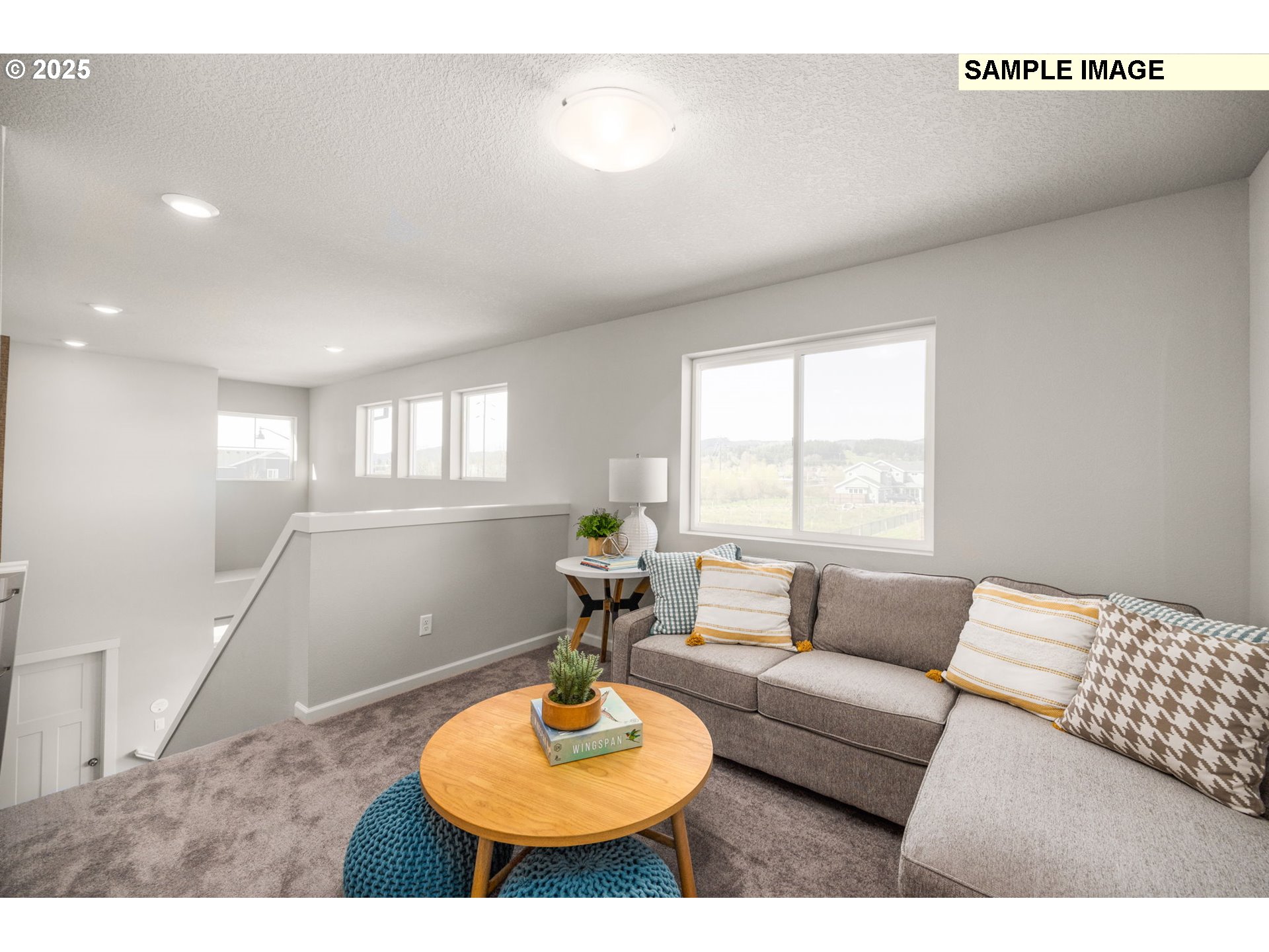 8842 Southwest Choke Cherry Tualatin, OR 97062 - Photo 15 of 29 a living room with furniture and a window