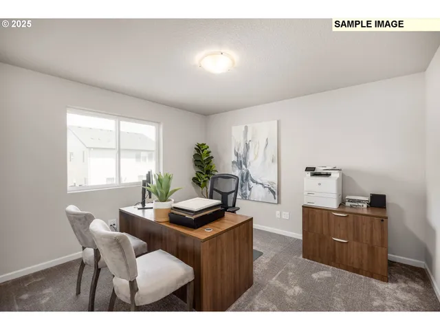a living room with furniture a window and wooden floor