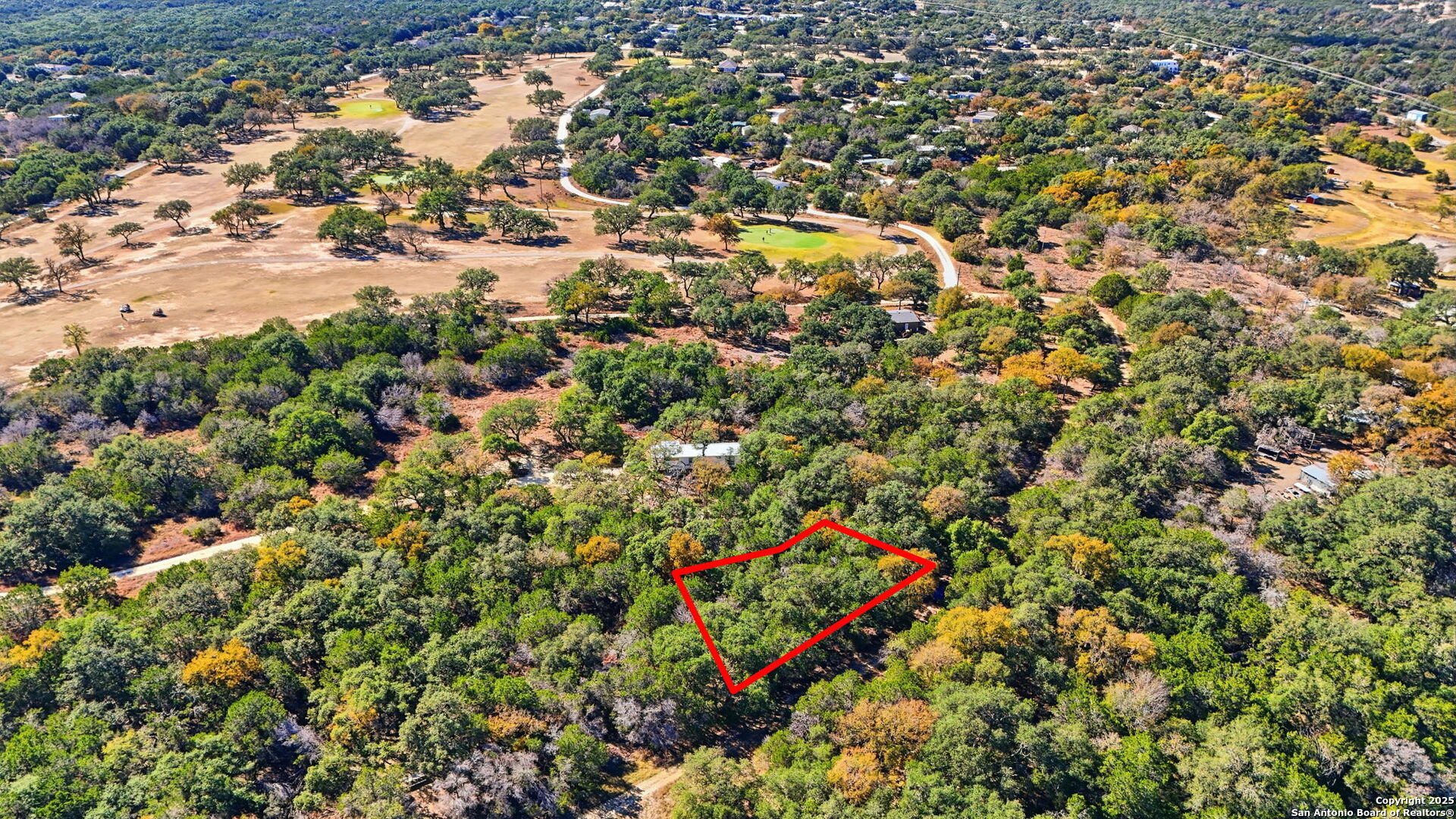190 North Contour Drive Spring Branch, TX 78070 - Photo 1 of 8 an aerial view of house with yard and covered with trees