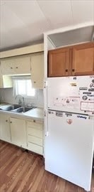 1515 VFW Parkway, Unit M19 Boston, MA 02132 - Photo 2 of 13 a view of kitchen with wooden floor