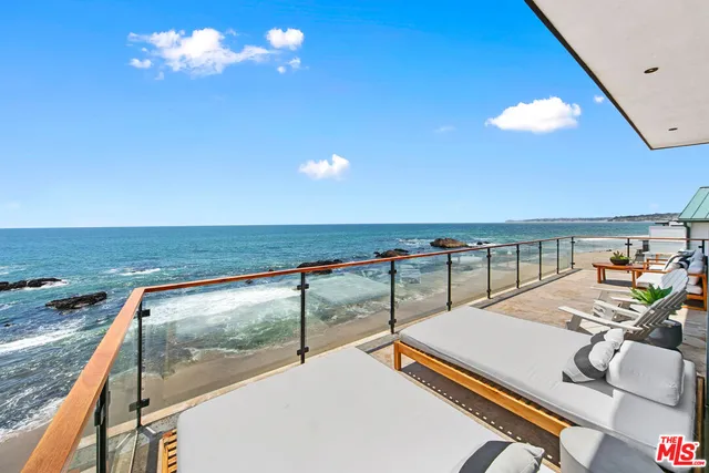 a view of swimming pool with outdoor seating