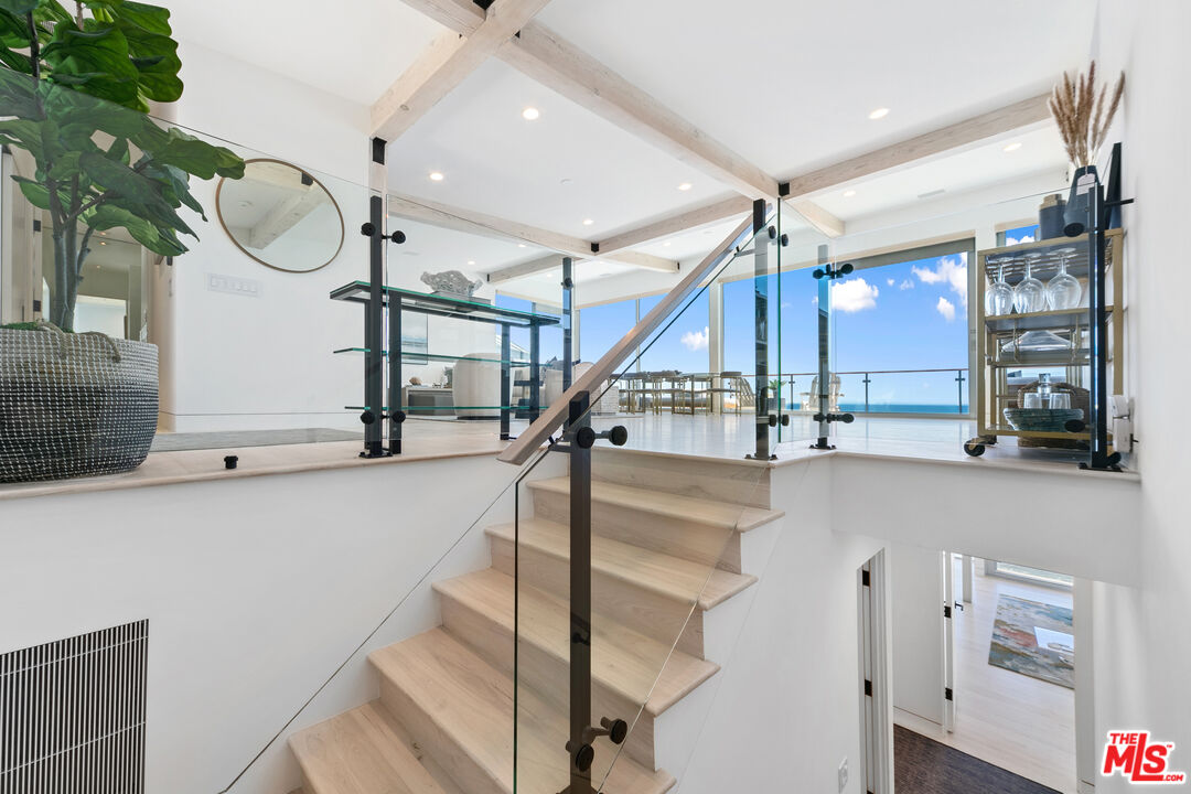 24928 Malibu Road Malibu, CA 90265 - Photo 14 of 50 a view of entryway and hall with wooden floor