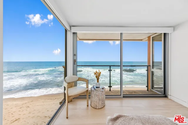 a bathroom with a double vanity sink and mirror